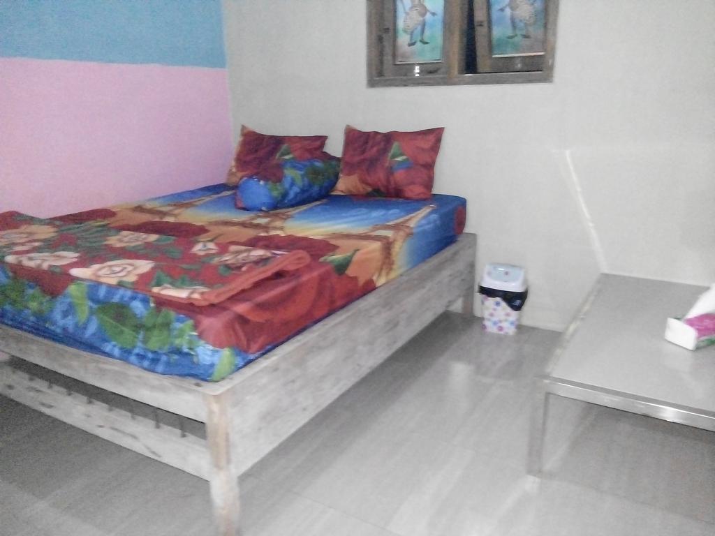 Yunior Guesthouse Tamansuruh Extérieur photo